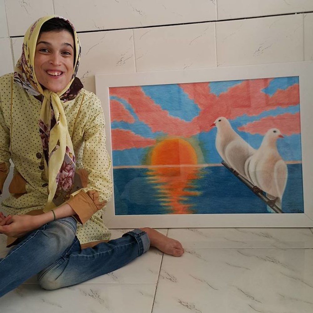 Iranian disabled painter draws pictures with his feet - 44