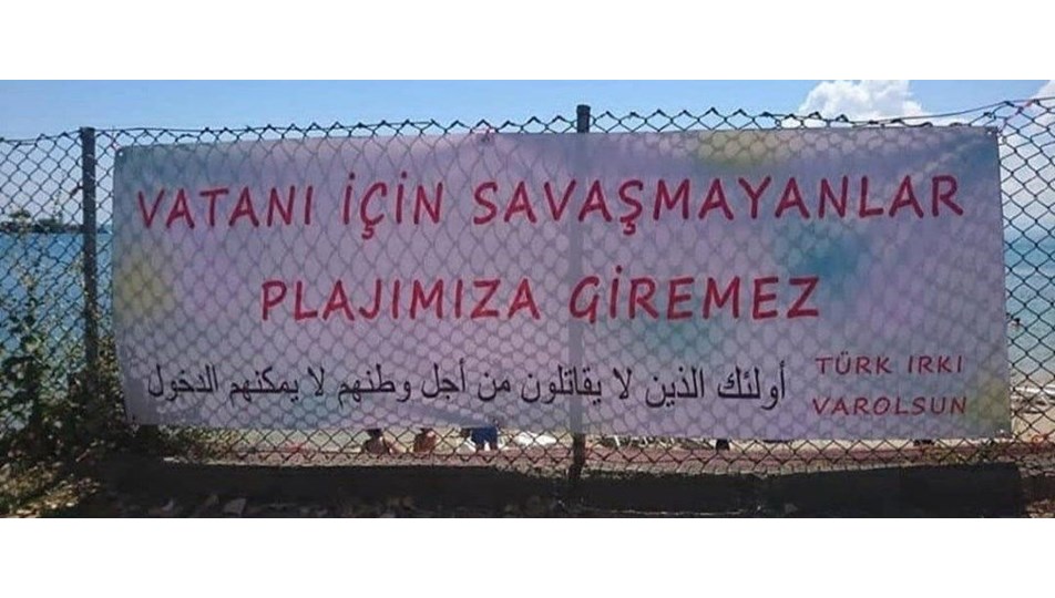 Plajdaki tepki çeken tabela kaldırıldı