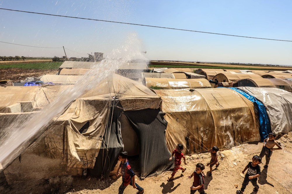 İdlib'deki kamplarda termometreler 50 dereceyi gösterdi: Hayatımızın en zor günlerinden - 7