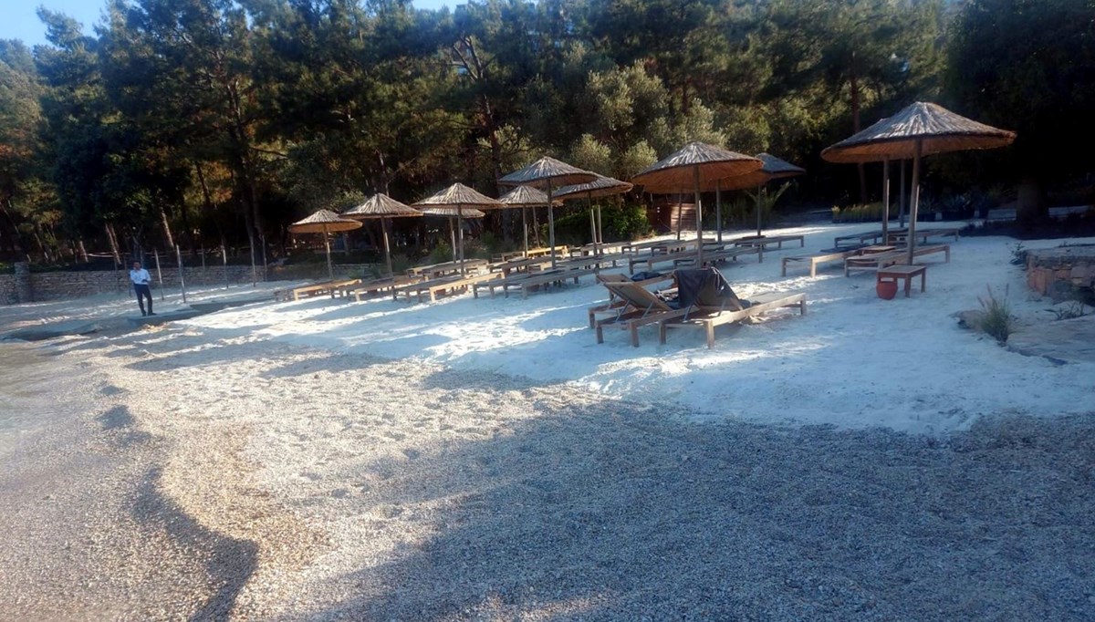 Bodrum'da sahile beyaz kum döken siteye ceza Bodrum'da sahile beyaz kum döken siteye ceza