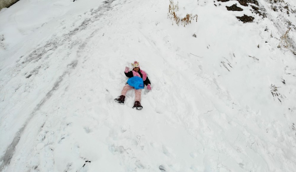 Yuvarlanarak gelen neşe: Kar, kızak ihtiyacını ortadan kaldırdı 74 oHy3sAebiUqs4H9Iw4U1rA