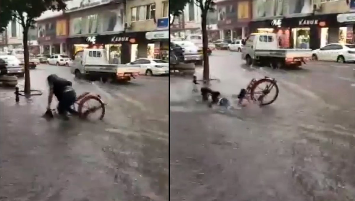 Bursa'da yağışta bisikletle giderken çukura düştü