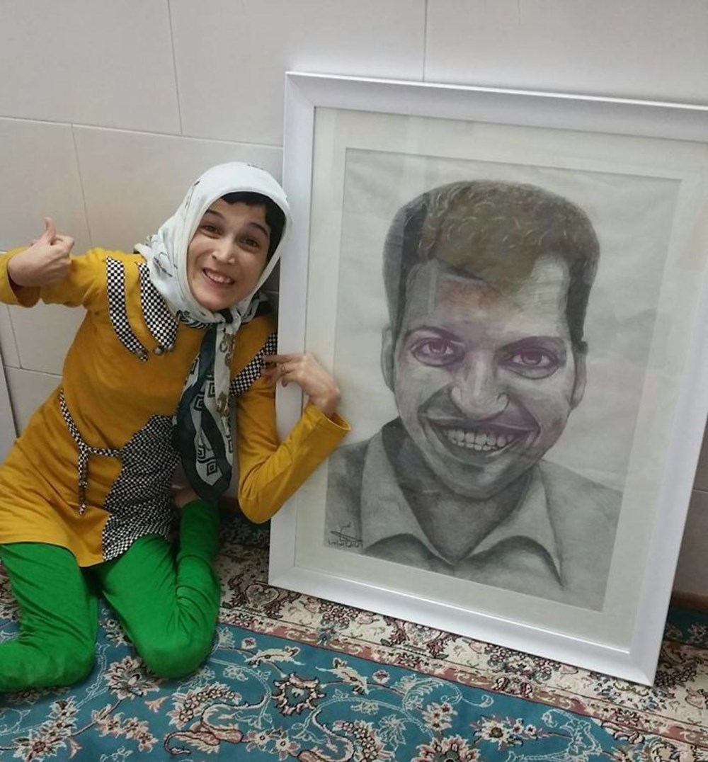 Iranian disabled painter draws pictures with his feet - 59