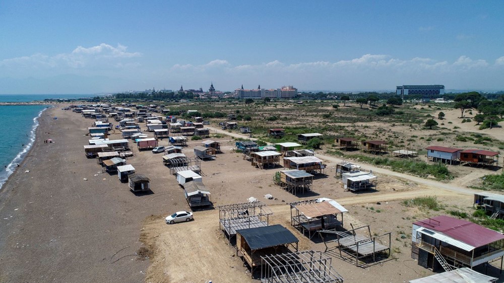 5 yıldızlı otellerin yanındaki “Çardakkondular” kent olma yolunda | Barakalara güneş panelleri bağlandı, kendi marketi de var - 8
