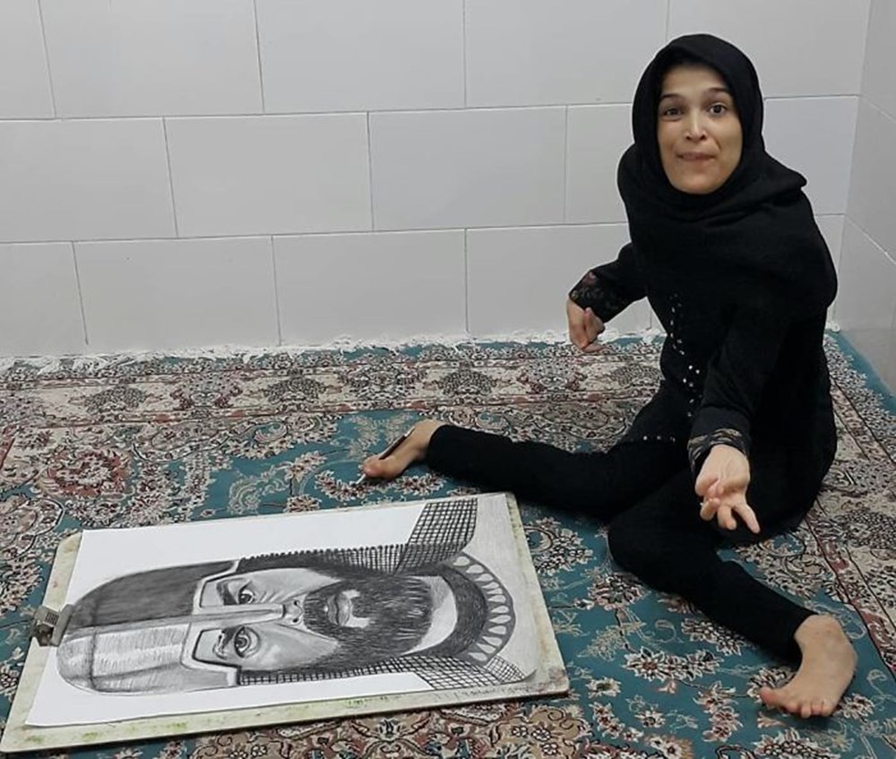 Iranian disabled painter draws pictures with his feet - 56