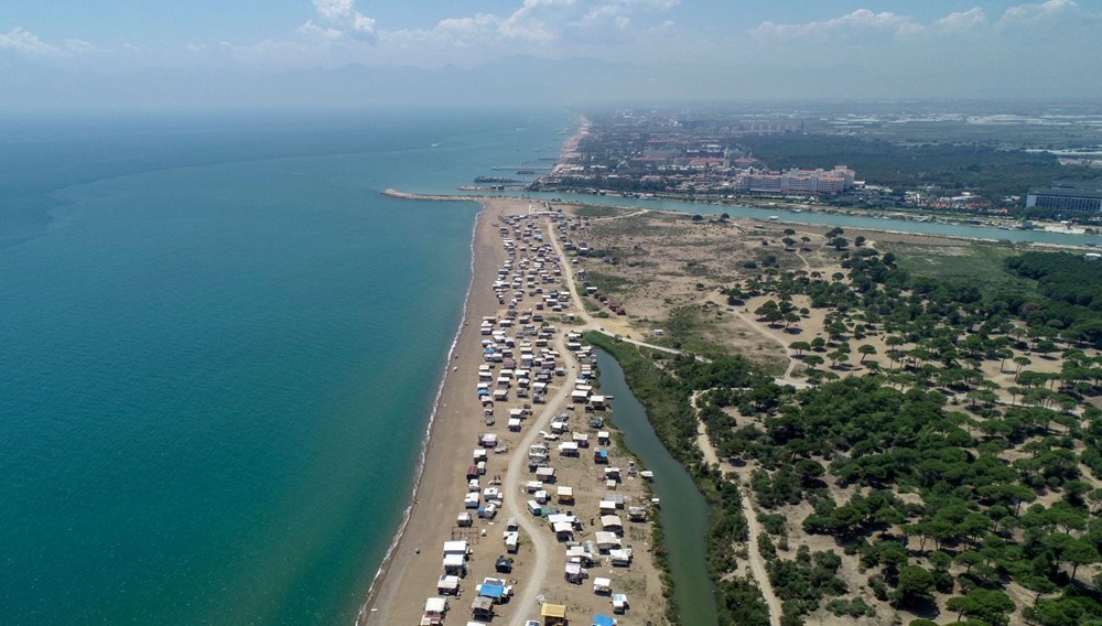 5 yıldızlı otellerin yanındaki “Çardakkondular” kent olma yolunda | Barakalara güneş panelleri bağlandı, kendi marketi de var - 3
