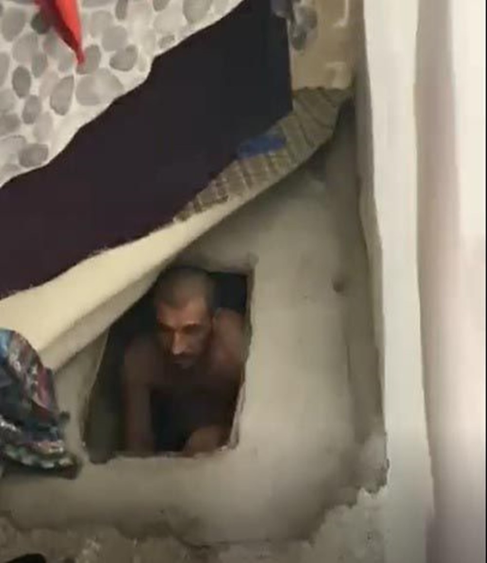 Birçok suçtan aranan şüpheli, kanepenin altındaki çukurda
yakalandı - 2