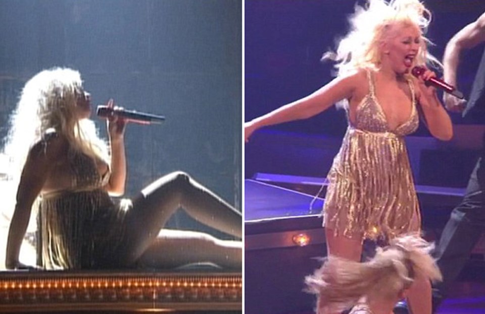 Christina Aguilera altın rengi pullarla süslenmiş dar ve kısa elbisesiyle baştan çıkarıcı şarkıyı söyleyerek seksi yanını sergiliyor