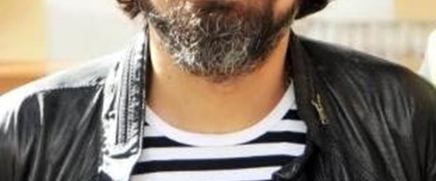 Saçı sakalı karıştı